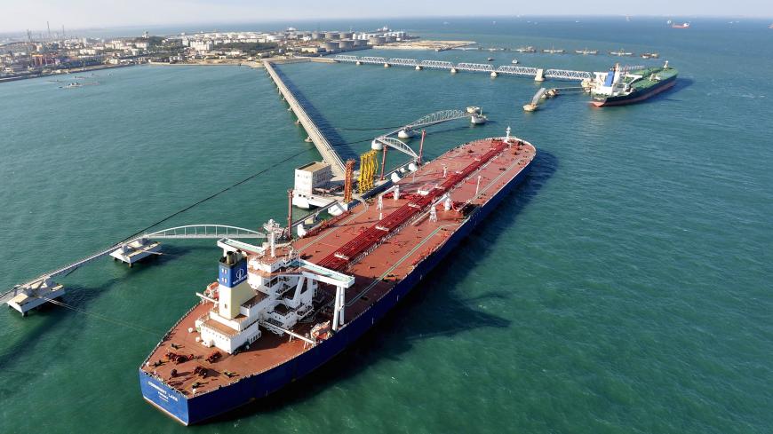 A general view of a crude oil importing port in Qingdao, Shandong province, in this November 9, 2008 file photo.   REUTERS/Stringer/Files ATTENTION EDITORS - THIS PICTURE WAS PROVIDED BY A THIRD PARTY. THIS PICTURE IS DISTRIBUTED EXACTLY AS RECEIVED BY REUTERS, AS A SERVICE TO CLIENTS. CHINA OUT. NO COMMERCIAL OR EDITORIAL SALES IN CHINA  - GF10000374046