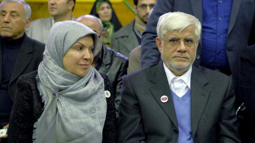 Iranian former vice-president Mohammad Reza Aref and his wife Hamideh Moravvej Farshi attend a reformist campaign for upcoming parliamentary election, in Tehran February 18, 2016. REUTERS/Raheb Homavandi/TIMA  ATTENTION EDITORS - THIS IMAGE WAS PROVIDED BY A THIRD PARTY. FOR EDITORIAL USE ONLY.    - GF10000314084
