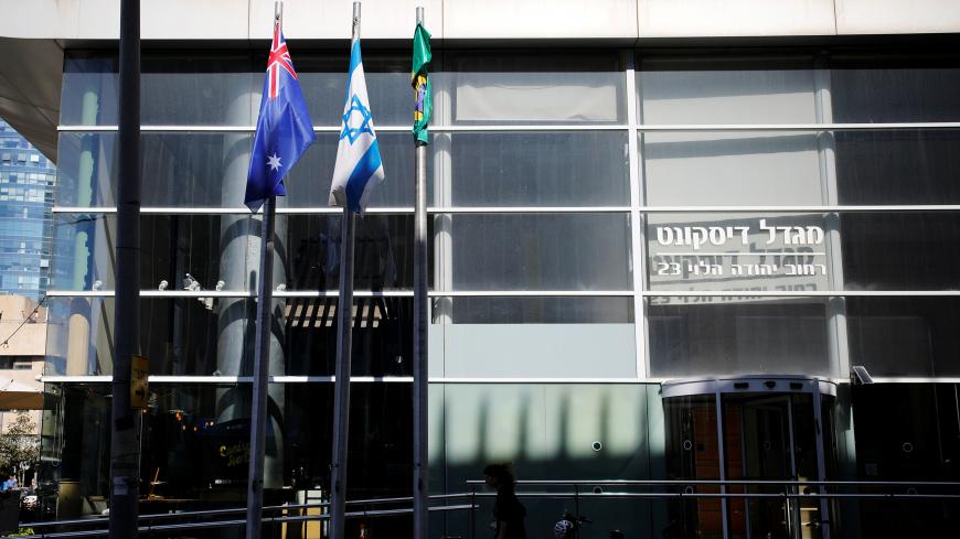 The national flags of Australia and Israel are seen outside the building housing the Australian Embassy in Tel Aviv, Israel October 16, 2018 REUTERS/Amir Cohen - RC1C0F4C5BF0