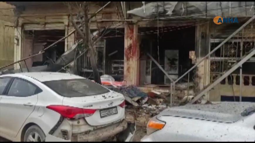 An image grab taken from a video published by Hawar News Agency (ANHA) on January 16, 2019, shows the aftermath of a suicide attack in the northern Syrian town of Manbij. - A suicide attack targeting US-led coalition forces in the flashpoint northern Syrian city of Manbij killed a US serviceman and 14 other people today, a monitor said. (Photo by - / various sources / AFP)        (Photo credit should read -/AFP/Getty Images)