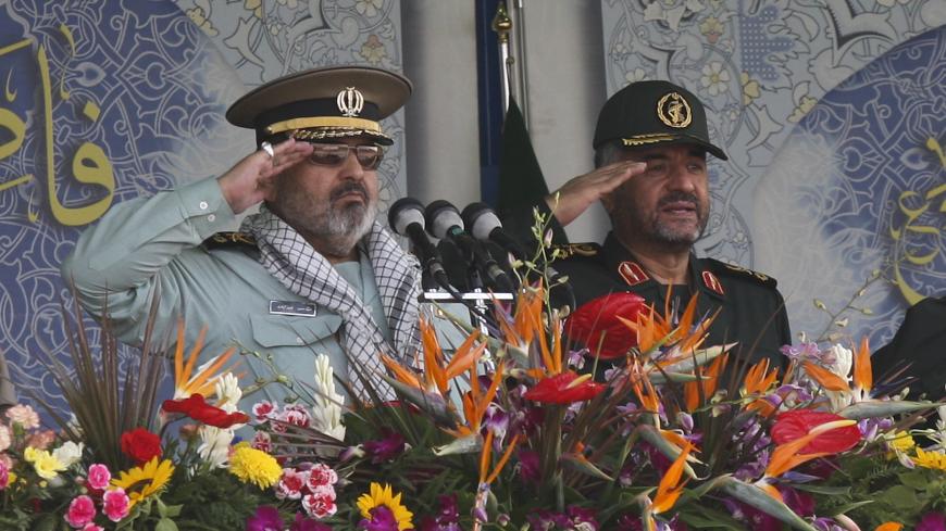 EDITORS' NOTE: Reuters and other foreign media are subject to Iranian restrictions on their ability to report, film or take pictures in Tehran. 

Iran's Armed Forces Chief of Staff Hassan Firouzabadi (L) and Revolutionary guards commander Mohammad Ali Jafari salute during a parade to commemorate the anniversary of the Iran-Iraq war (1980-88), in Tehran September 22, 2011. REUTERS/Stringer (IRAN - Tags: POLITICS MILITARY ANNIVERSARY) - GM1E79M1GOU01