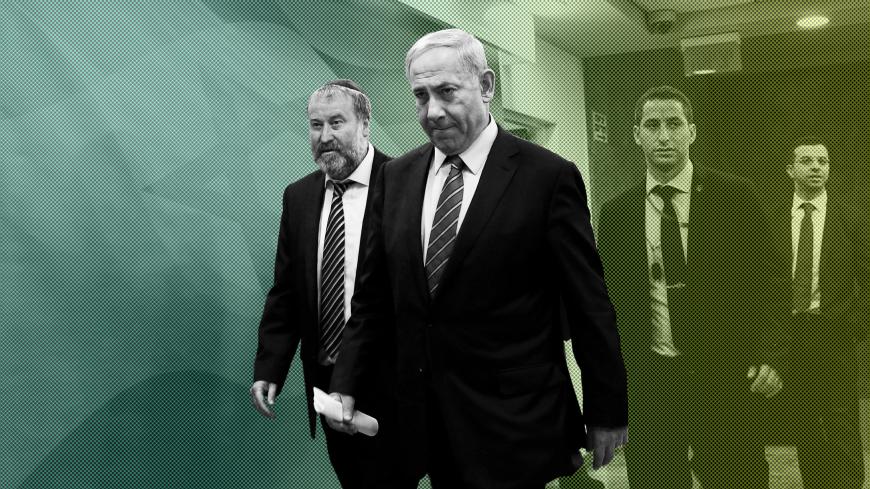 Israel's Prime Minister Benjamin Netanyahu (2nd L) and Cabinet Secretary Avichai Mandelblit (L) arrive to the weekly cabinet meeting in Jerusalem November 16, 2014.  REUTERS/Gali Tibbon/Pool (JERUSALEM - Tags: POLITICS) - GM1EABG1G1D01