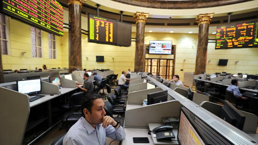 A trader works at the Egyptian stock exchange in Cairo, Egypt September 20, 2018. REUTERS/Mohamed Abd El Ghany - RC1B28059140