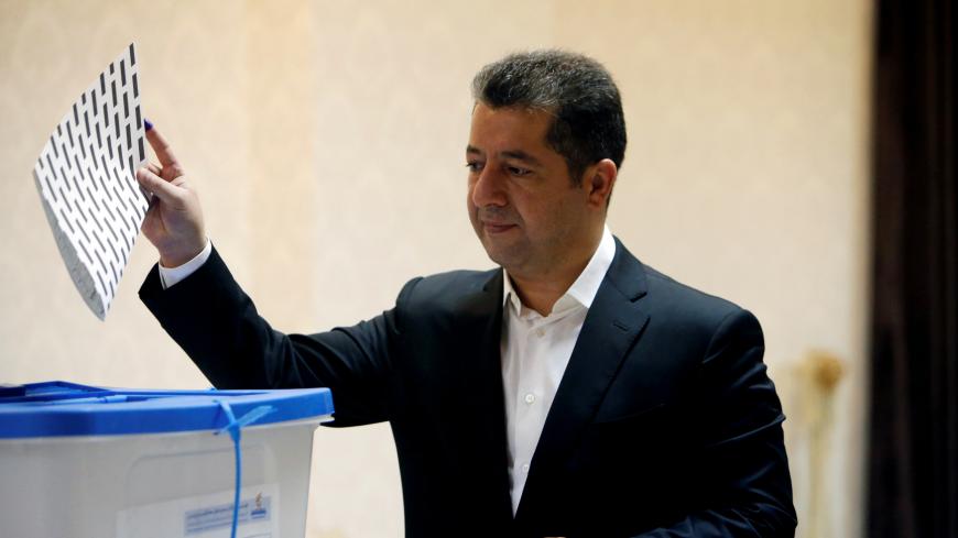 Iraqi Kurdish security chief Masrour Barzani, casts his vote, during parliamentary elections in the semi-autonomous region, on the outskirts of Erbil, Iraq September 30, 2018. REUTERS/Azad Lashkari - RC16387D9690