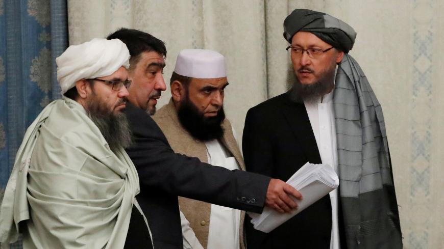 Members of Taliban delegation take their seats during the multilateral peace talks on Afghanistan in Moscow, Russia November 9, 2018. REUTERS/Sergei Karpukhin - RC1BDF87BDC0