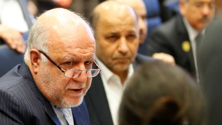 Iran's Oil Minister Bijan Zanganeh talks to journalists at the beginning of an OPEC meeting in Vienna, Austria December 6, 2018.   REUTERS/Leonhard Foeger - RC1F5D012E50