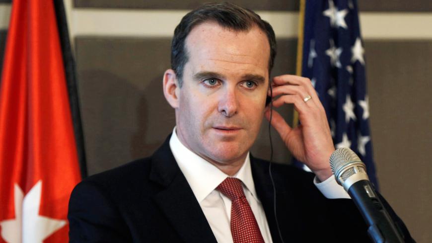 Brett McGurk, the United States' envoy to the coalition against Islamic State, listens to the translation during a news conference in Amman, Jordan, May 15, 2016. REUTERS/Muhammad Hamed - S1BETEFFFVAA