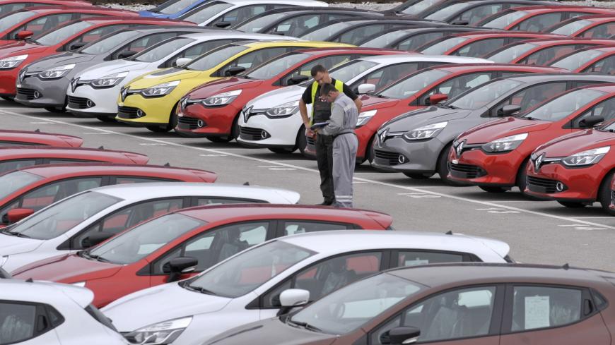Renault cars produced in Turkey and awaiting export throughout Europe, are checked by workers in the port of Koper October 14, 2013. Automotive industry association ACEA said October 16, 2013, that new car registrations in Europe climbed 5.5 percent to 1.19 million vehicles in September, only the third month a gain was recorded in the past two years. But within the European Union, the level of demand was the second lowest on record for the month of September since it began tabulating results for the 27 memb