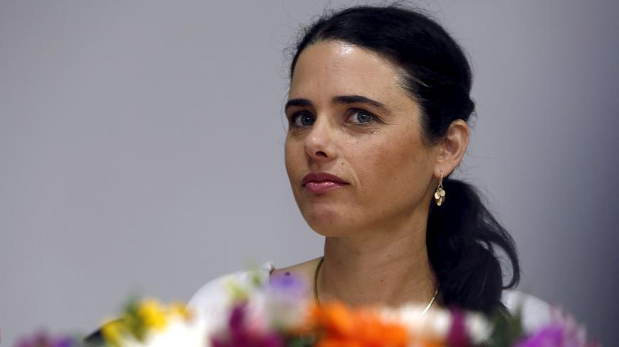 Ayelet Shaked, Israel's new Justice Minister of the far-right Jewish Home party, attends a ceremony at the Justice Ministry in Jerusalem May 17, 2015. REUTERS/Gali Tibbon/Pool/File Photo - S1BEUKSEQVAA
