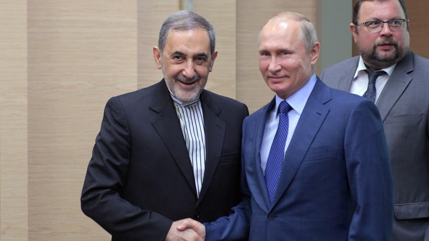 Russian President Vladimir Putin shakes hands with Ali Akbar Velayati, a top advisor to Iran's Supreme Leader Ayatollah Ali Khamenei, during their meeting at the Novo-Ogaryovo state residence outside Moscow, Russia July 12, 2018. Sputnik/Alexei Druzhinin/Kremlin via REUTERS ATTENTION EDITORS - THIS IMAGE WAS PROVIDED BY A THIRD PARTY. - RC1122CD2770