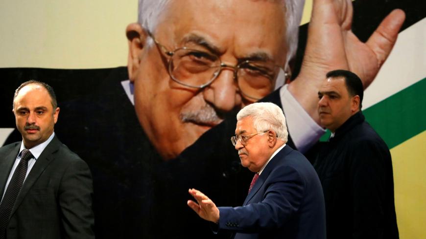 Palestinian President Mahmoud Abbas gestures during a ceremony marking the 54th anniversary of Fatah's founding, in Ramallah, in the Israeli-occupied West Bank December 31, 2018. REUTERS/Mohamad Torokman - RC1510C8D980