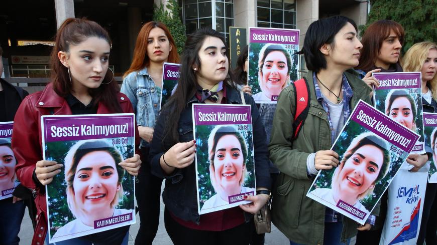Women protest femicide before the trial regarding the death of Sule Cet, who was allegedly killed by being thrown off the 20th floor of a luxury building in Ankara, on November 8, 2018. (Photo by ADEM ALTAN / AFP)        (Photo credit should read ADEM ALTAN/AFP/Getty Images)
