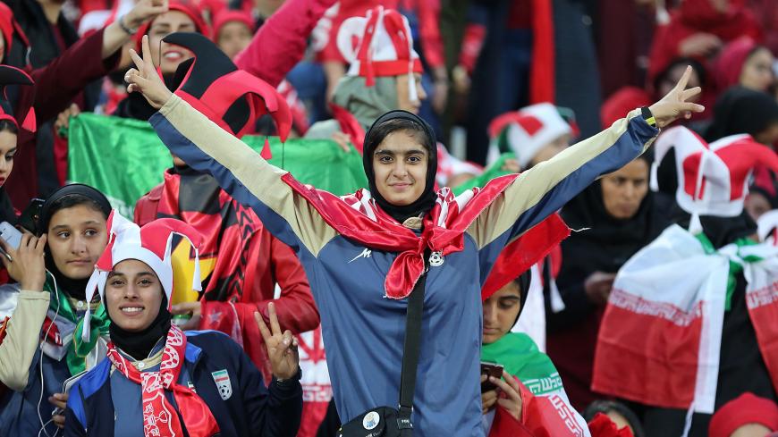 Persepolis' female fans cheer for their team during the second leg of the AFC Champions League final football match between Iran's Persepolis and Japan's Kashima Antlers on November 10, 2018, at the Azadi Stadium in Tehran. (Photo by ATTA KENARE / AFP)        (Photo credit should read ATTA KENARE/AFP/Getty Images)