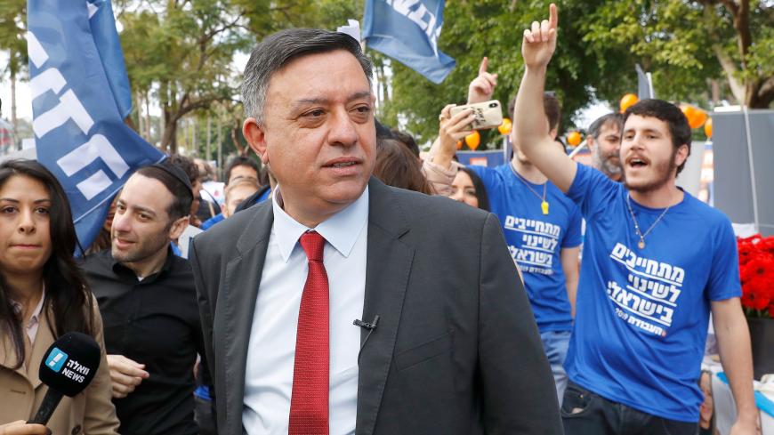 Avi Gabbay (L), chairman of Israel's Labour Party, arrives to vote during the primaries of the party in the coastal city of Tel Aviv on February 11, 2019. - The 120-seat parliament general elections will be held on April 9, 2019. (Photo by JACK GUEZ / AFP)        (Photo credit should read JACK GUEZ/AFP/Getty Images)