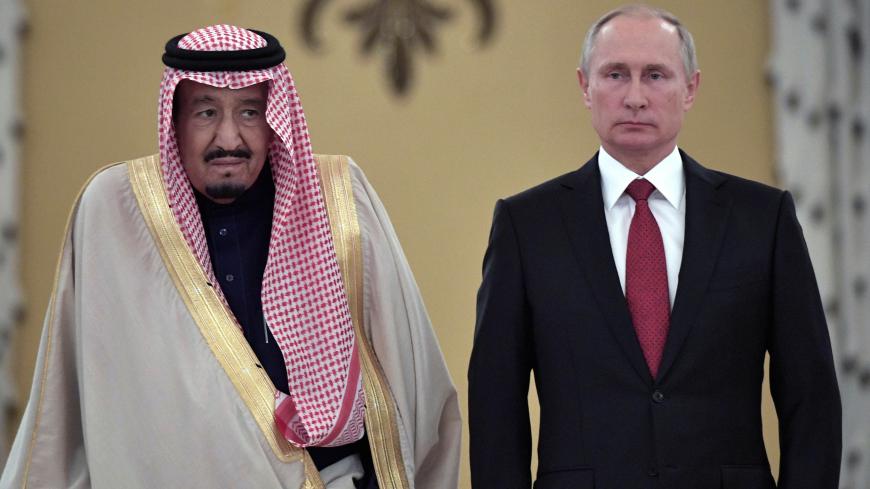 Russian President Vladimir Putin (R) and Saudi Arabia's King Salman attend a welcoming ceremony ahead of their talks in the Kremlin in Moscow, Russia October 5, 2017. Sputnik/Alexei Nikolsky/Kremlin via REUTERS ATTENTION EDITORS - THIS IMAGE WAS PROVIDED BY A THIRD PARTY. - RC1280FB8D90