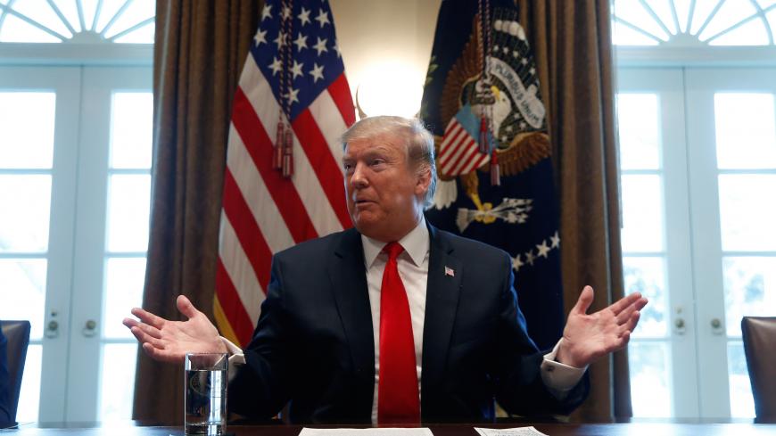 U.S. President Donald Trump speaks during a meeting to "discuss fighting human trafficking on the southern border" in the Cabinet Room of the White House in Washington, U.S., February 1, 2019. REUTERS/Jim Young - RC1D461FF590