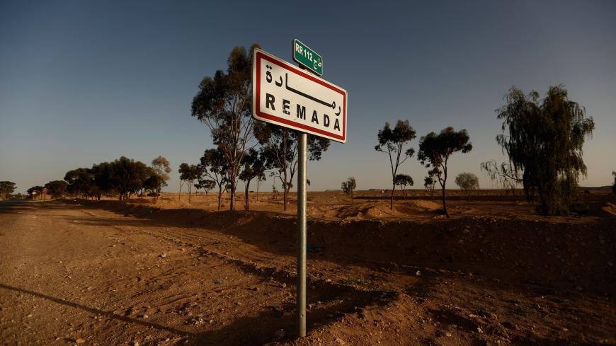 A sign is seen at the edge of Remada, Tunisia April 11, 2016. Tunisia's 2011 uprising created fertile ground for jihadist recruiters. Hundreds of Islamist militants were freed from prison as part of an amnesty for those detained under Ben Ali. Ultra-conservative salafists began to flex their muscle, seizing control of mosques and clashing with secularists. As Tunisia's politics have stabilised, the government has reasserted control, taking back mosques, banning the local al Qaeda affiliate Ansar al Sharia, 