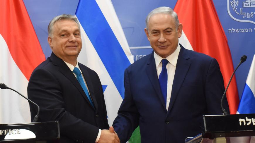 Hungarian Prime Minister Viktor Orban shakes hands with Israeli Prime Minister Benjamin Netanyahu during a joint statment, at the prime minister's office in Jerusalem,  July 19, 2018.  Debbie Hill/Pool via Reuters - RC13F129AE70