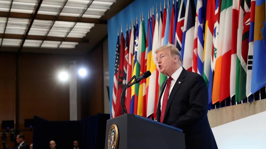 U.S. President Donald Trump delivers remarks to foreign ministers from the Global Coalition to Defeat ISIS at the State Department in Washington, U.S., February 6, 2019. REUTERS/Leah Millis - RC1528E7D100