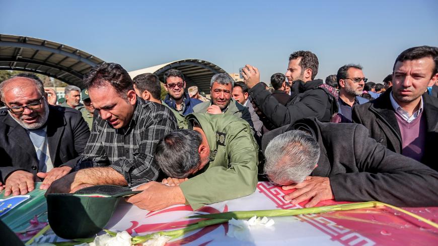 Relatives of a member of Iran's elite Revolutionary Guards, who was killed by a suicide car bomb, mourn at Isfahan airport, Iran February 14, 2019. Morteza Salehi/Tasnim News Agency/via REUTERS ATTENTION EDITORS - THIS PICTURE WAS PROVIDED BY A THIRD PARTY - RC174550BE30