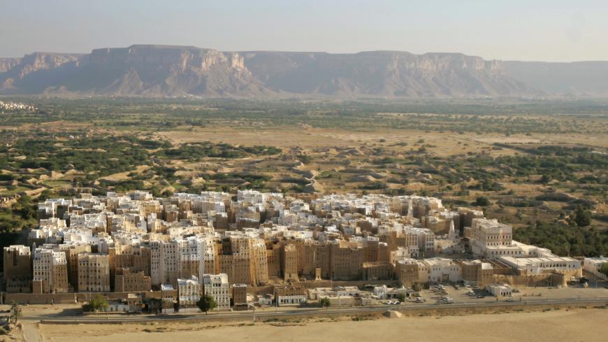 An aerial view of historical city of Shibam in southeastern Yemen  March 18, 2009. Shibam, a UNESCO World Heritage site, is dubbed the "Manhattan of the desert" for its 16th-century tower houses. REUTERS/Khaled Abdullah (YEMEN TRAVEL CITYSCAPE) - GM1E53J0CGJ01