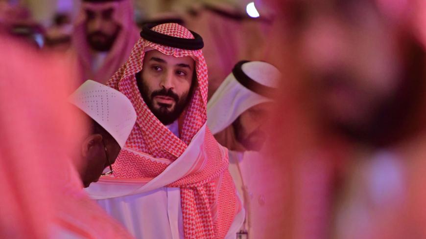 TOPSHOT - Saudi Crown Prince Mohammed bin Salman arrives at the Future Investment Initiative FII conference in the Saudi capital Riyadh on October 24, 2018. - The summit, nicknamed "Davos in the desert", has been overshadowed by growing global outrage over the murder of a Saudi journalist inside the kingdom's consulate in Istanbul. (Photo by GIUSEPPE CACACE / AFP)        (Photo credit should read GIUSEPPE CACACE/AFP/Getty Images)