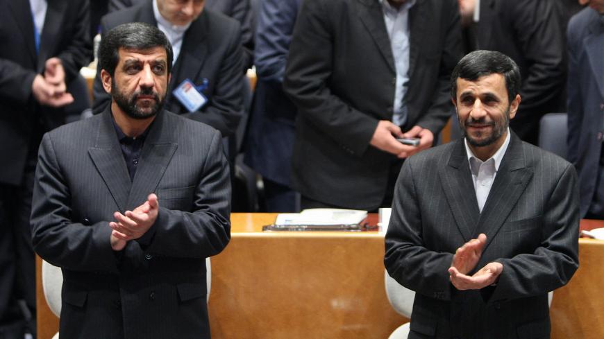 Iranian President Mahmoud Ahmadinejad (R) and head of Iran TV, Ezzatollah Zarghami, (L) applaud as they attend the 44th General assembly of the Asia-Pacific Broadcaasting Union in Tehran 03 November 2007. AFP PHOTO/ATTA KENARE (Photo credit should read ATTA KENARE/AFP/Getty Images)