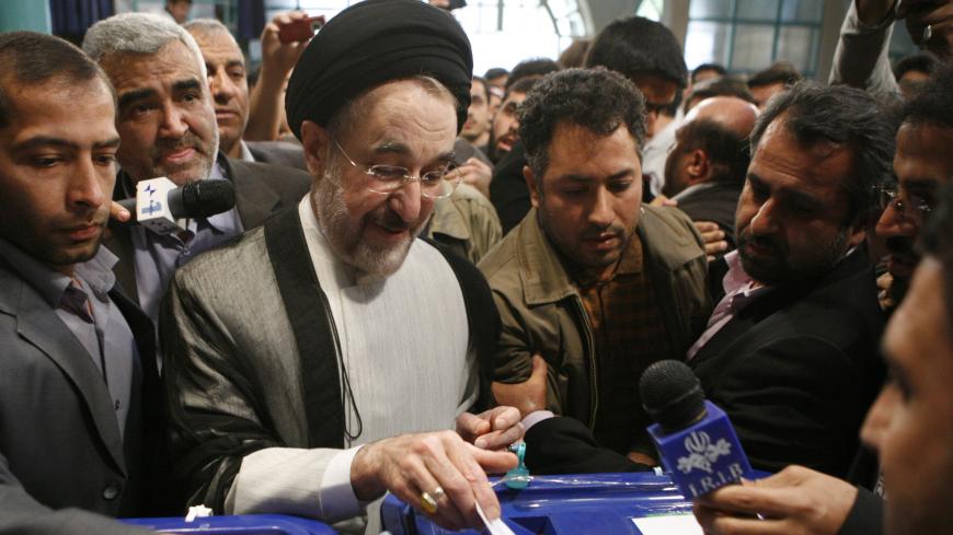 Iran's former president Mohammad Khatami casts his ballot during the presidential election, north of Tehran June 12, 2009.REUTERS/Chavosh Homavandi/jamejamonline  (IRAN POLITICS ELECTIONS) - GM1E56C1H9U01