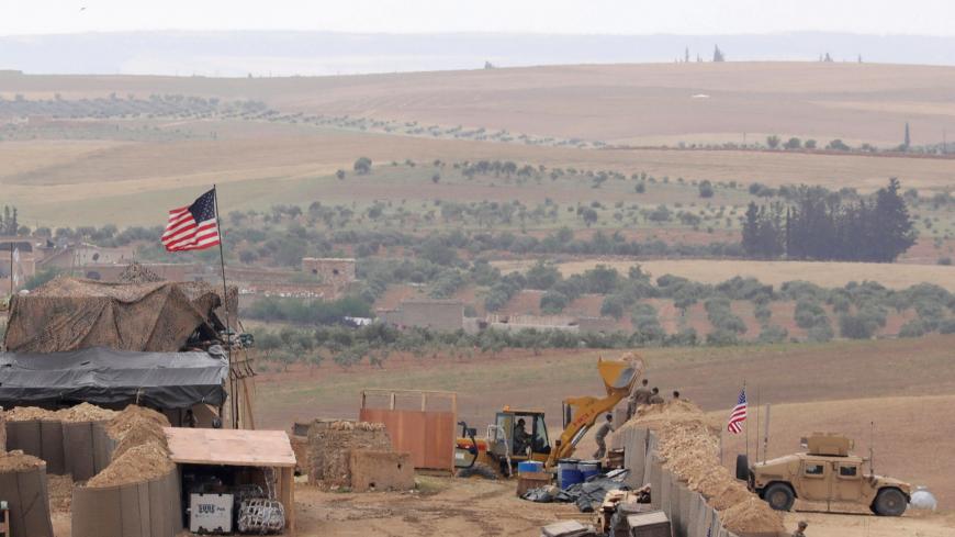 U.S. forces set up a new base in Manbij, Syria May 8, 2018. Picture Taken May 8, 2018. REUTERS/Rodi Said - RC1504520BB0