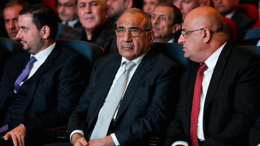 Iraq's Prime Minister Adel Abdul Mahdi (C) attends the opening of  Baghdad International Fair, Iraq November 10, 2018.  REUTERS/Thaier al-Sudani - RC1551782260