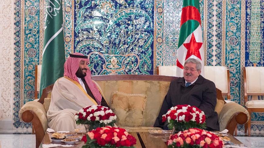 Saudi Arabia's Crown Prince Mohammed bin Salman meets with Algerian Prime Minister Ahmed Ouyahia in Algiers, Algeria December 2, 2018.  Picture taken December 2, 2018. Bandar Algaloud/Courtesy of Saudi Royal Court/Handout via REUTERS ATTENTION EDITORS - THIS PICTURE WAS PROVIDED BY A THIRD PARTY. - RC11742D93D0