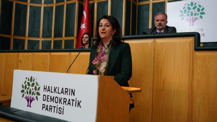 Pervin Buldan, co-leader of the pro-Kurdish Peoples' Democratic Party (HDP), speaks before starting a two-day hunger strike in support of jailed Kurdish lawmaker Leyla Guven's own hunger strike against the isolation of Kurdish rebel leader Abdullah Ocalan in prison, at the Turkish Parliament in Ankara, Turkey December 4, 2018. REUTERS/Umit Bektas - RC17525CE770