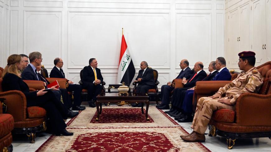 U.S. Secretary of State Mike Pompeo (L) talks with Iraqi Prime Minister Adel Abdul-Mahdi (R) in Baghdad, Iraq, during a Middle East tour, January 9, 2019.  Andrew Caballero-Reynolds/Pool via REUTERS - RC1DFD99C200