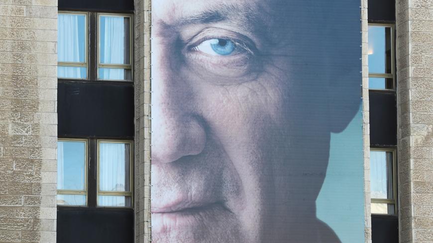 Part of a campaign poster of Benny Gantz, a former Israeli armed forces chief and the head of a new political party, Israel Resilience, is seen in Jerusalem, January 29, 2019 REUTERS/Ammar Awad - RC14E2E1BA00
