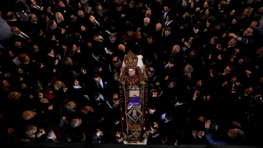 Mourners attend the funeral of Armenian Patriarch Mesrob II Mutafyan at Surp Asdvadzadzin Patriarchal Church in Istanbul, Turkey, March 17, 2019. REUTERS/Umit Bektas     TPX IMAGES OF THE DAY - RC16121CA2E0