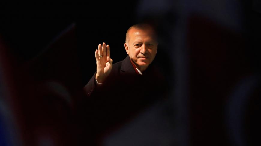 Turkish President Tayyip Erdogan greets AK Party supporters during a rally for the upcoming local elections in Istanbul, Turkey, March 19, 2019. REUTERS/Umit Bektas - RC18667C3AB0