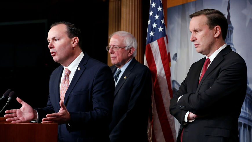 Senators Mike Lee (R-UT), Bernie Sanders (I-VT) and Chris Murphy (D-CT) speak after the senate voted on a resolution ending U.S. military support for the war in Yemen on Capitol Hill in Washington, U.S., December 13, 2018.      REUTERS/Joshua Roberts - RC13D91DD370