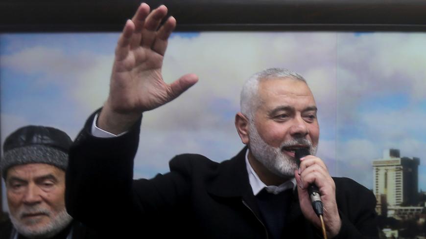 Palestinian Hamas Chief Ismail Haniyeh welcomes Hamas members who went missing in Egypt a few years ago, after their arrival in Gaza City February 28, 2019. REUTERS/Ibraheem Abu Mustafa - RC18F17FF320