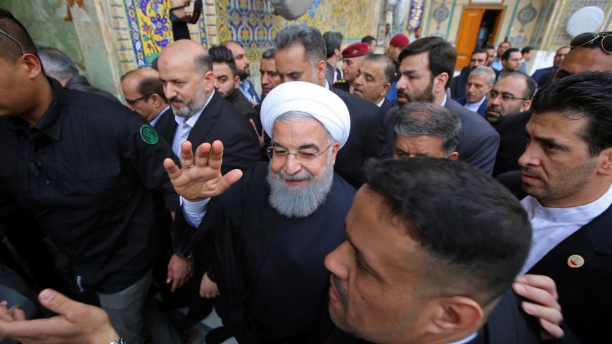 Iranian President Hassan Rouhani visits the shrine of Imam Ali in Najaf, Iraq, March 13, 2019 . REUTERS/Alaa Al-Marjani - RC1527D5C9D0