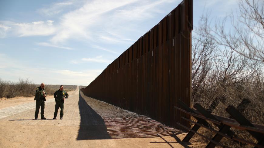 New bollard-style U.S.-Mexico border fencing is seen next to vehicle barriers in Santa Teresa, New Mexico, U.S., March 5, 2019.  Picture taken March 5, 2019. REUTERS/Lucy Nicholson     TPX IMAGES OF THE DAY - RC16D209A700
