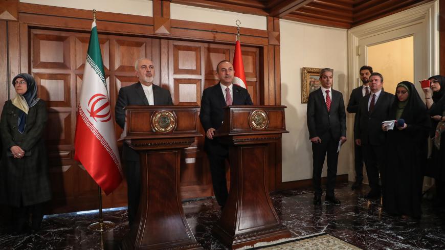 Turkish Foreign Minister Mevlut Cavusoglu (C) and Iranian Foreign Minister Mohammad Javad Zarif (2L) give a press conference in Ankara, Turkey, on April 17, 2019. (Photo by Adem ALTAN / AFP)        (Photo credit should read ADEM ALTAN/AFP/Getty Images)