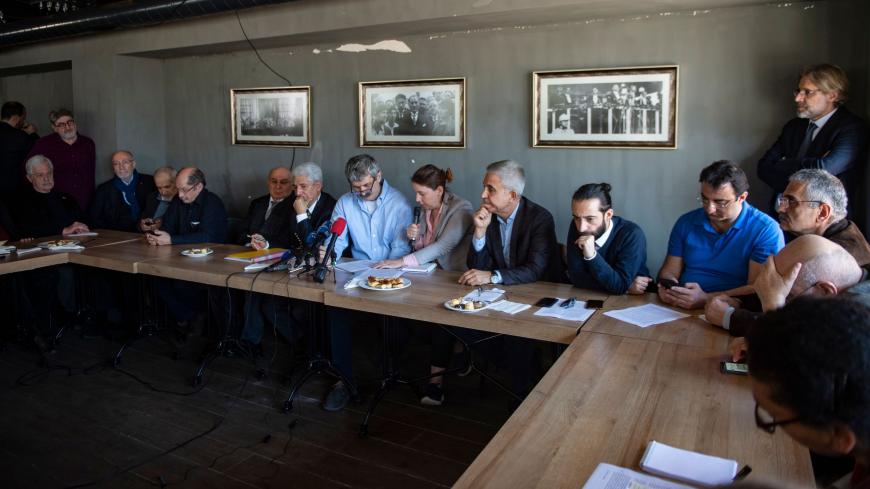 Opposition journalists hold a press conference in Istanbul on April 22, 2019. - Opposition journalists, who were initially supposed to remain free given their time served as part of the Cumhuriyet case, will have to go back to prison after an appeals court upholds their convictions in February 2019. (Photo by Yasin AKGUL / AFP)        (Photo credit should read YASIN AKGUL/AFP/Getty Images)