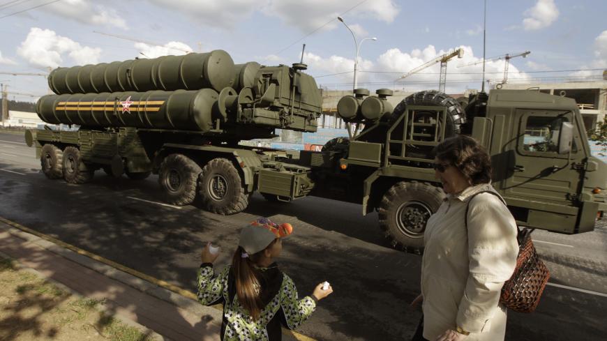 A Russian S-400 air defence mobile missile launching system takes part in a rehearsal for a military parade in Minsk June 26, 2014. Belarus will mark the 70th anniversary of the country's liberation from the Nazis on July 3. REUTERS/Vasily Fedosenko (BELARUS - Tags: MILITARY ANNIVERSARY) - GM1EA6R03KP01