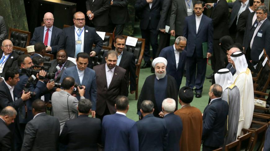 Iranian president Hassan Rouhani arrives for his swearing-in ceremony for a further term, at the parliament in Tehran, Iran, August 5, 2017. Nazanin Tabatabaee Yazdi/TIMA via REUTERS ATTENTION EDITORS - THIS IMAGE WAS PROVIDED BY A THIRD PARTY. - RC1E6A273D30