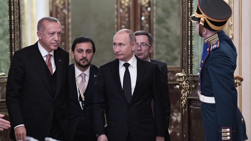 Russia's President Vladimir Putin (R, front) and his Turkish counterpart Tayyip Erdogan (L, front) attend a session of the Russian-Turkish Cooperation Council in Moscow, Russia April 8, 2019. Sputnik/Alexei Nikolsky/Kremlin via REUTERS  ATTENTION EDITORS - THIS IMAGE WAS PROVIDED BY A THIRD PARTY. - RC199AEEEE80