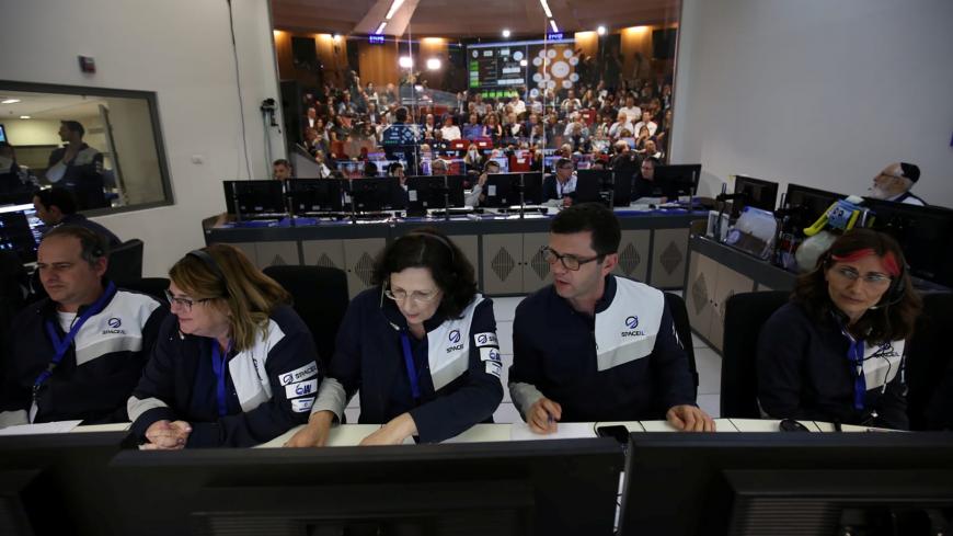 Members of the Israel spacecraft, Beresheet, are seen in the control room in Yahud, Israel April 11, 2019. Courtesy Space IL/Handout via REUTERS ATTENTION EDITORS -THIS IMAGE HAS BEEN SUPPLIED BY A THIRD PARTY - RC1E55AEFCC0