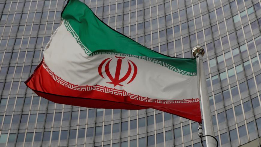 An Iranian flag flutters in front of the International Atomic Energy Agency (IAEA) headquarters in Vienna, Austria September 9, 2019.   REUTERS/Leonhard Foeger - RC13159EFD90