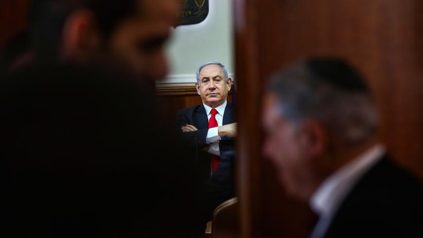 Israeli Prime Minister Benjamin Netanyahu chairs the weekly cabinet meeting in Jerusalem, March 8, 2020. Oded Balilty/Pool via Reuters - RC2MFF9EQO6E