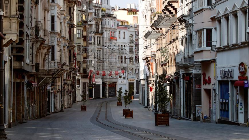 A general view shows the deserted Istiklal Street during a two-day curfew which was imposed to prevent the spread of the coronavirus disease (COVID-19), in Istanbul, Turkey, April 11, 2020. REUTERS//Umit Bektas - RC2H2G9Y460H