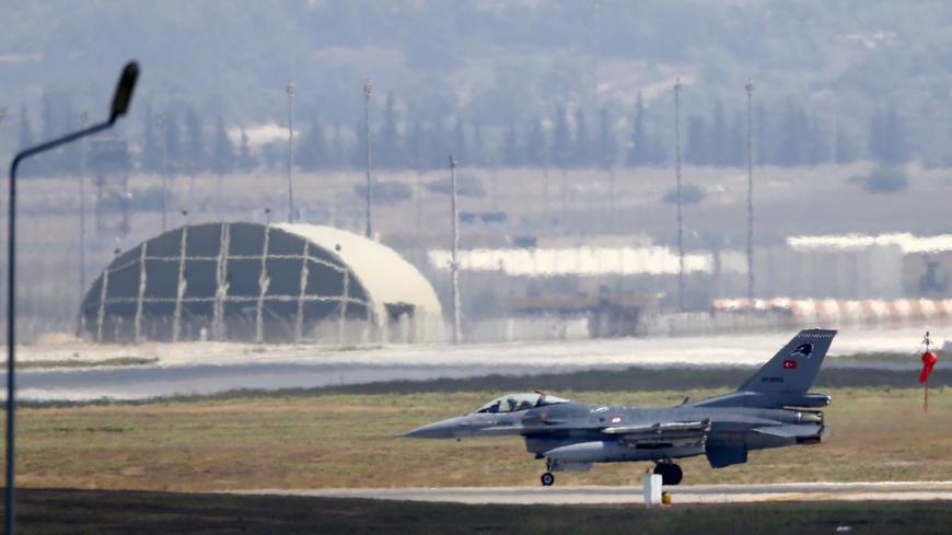 A Turkish Air Force F-16 fighter jet lands at Incirlik air base in Adana, Turkey, August 11, 2015. REUTERS/Murad Sezer  - GF20000020030